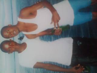 Me with Raymond at sand beach nabugabo masaka.