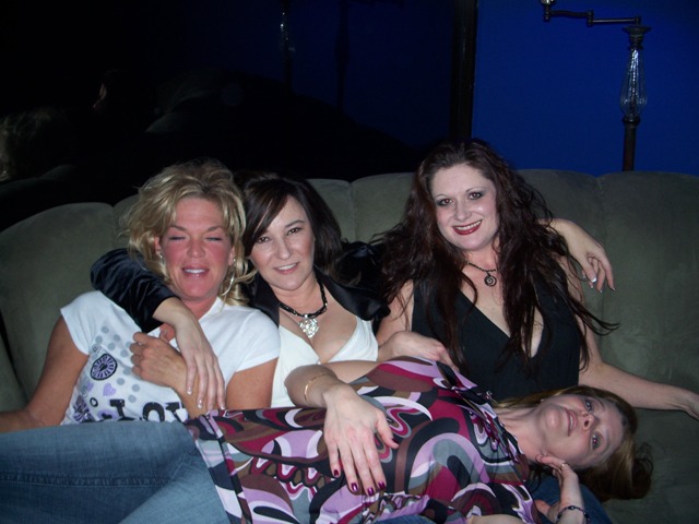 I am the one in the middle with the dark hair between the blonde and the dark long haired woman. Us 