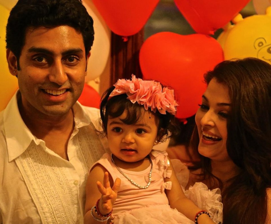 With her parents on her 1st birthday - 16 Nov 2012