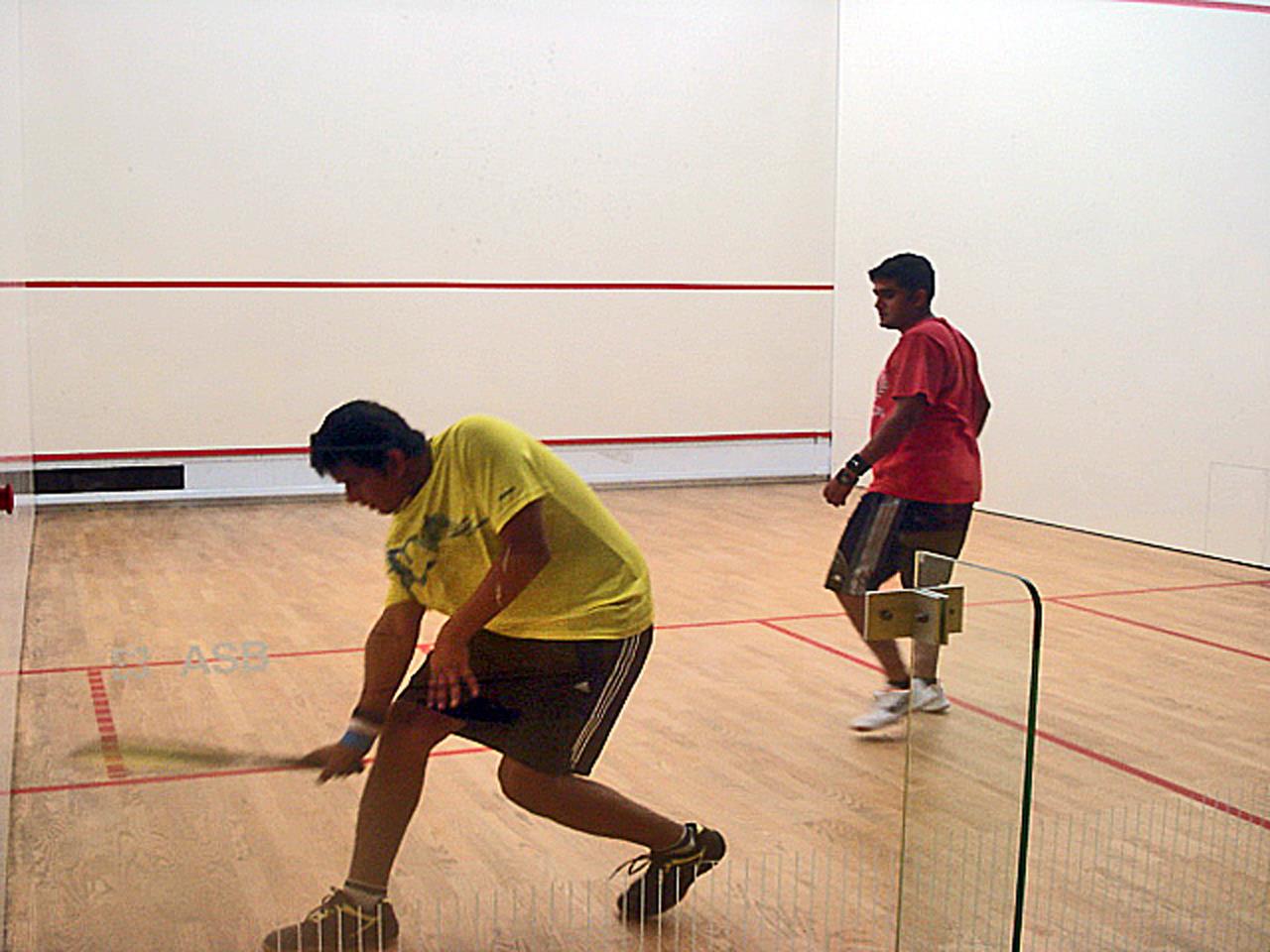 I love playing Squash..I can surely teach you.